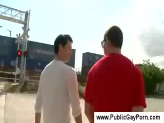 Gay buddy gives a bj in public