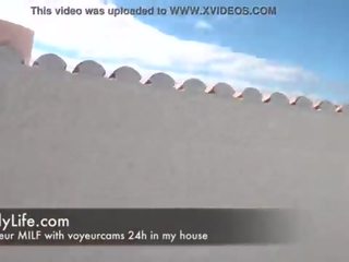 Amateur MILF fucking for a voyeur on the roof terrace