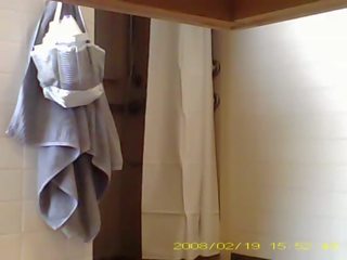 Spying flirty 19 year old young lady showering in dorm bathroom