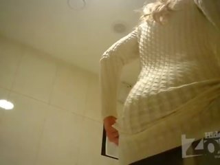 Beautiful blonde in toilet shaved pussy and anus closeups.